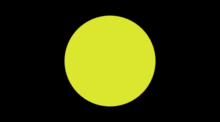 A large yellow circle on a black background.