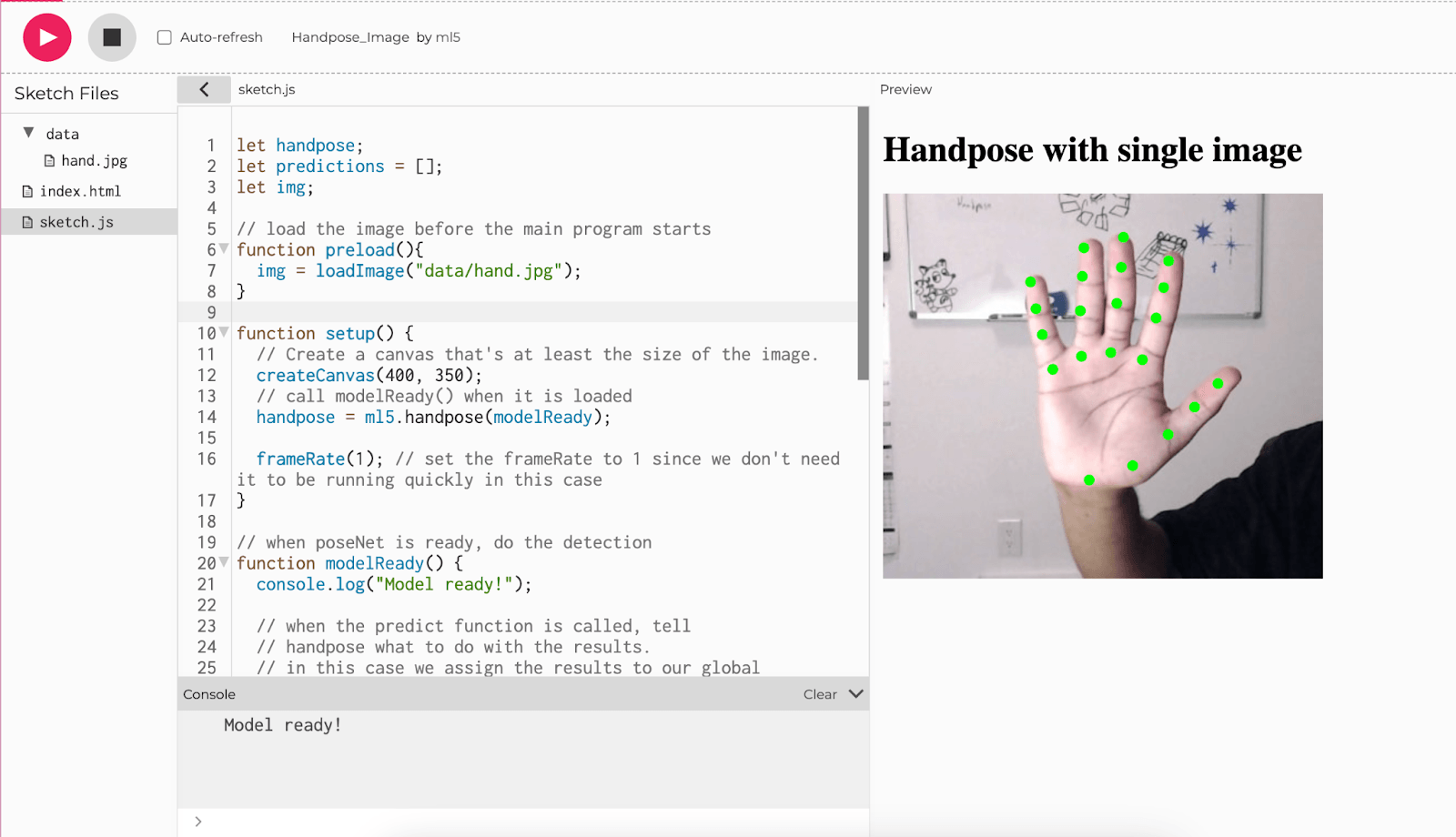 p5.js Webエディタで実行されているml5.js Handpose_Imageコード。手の画像がキャンバス上に表示され、各指と手のひらに沿って緑色の点が表示されています。キャンバスの上に「Handpose with single image」というテキストが表示されています。