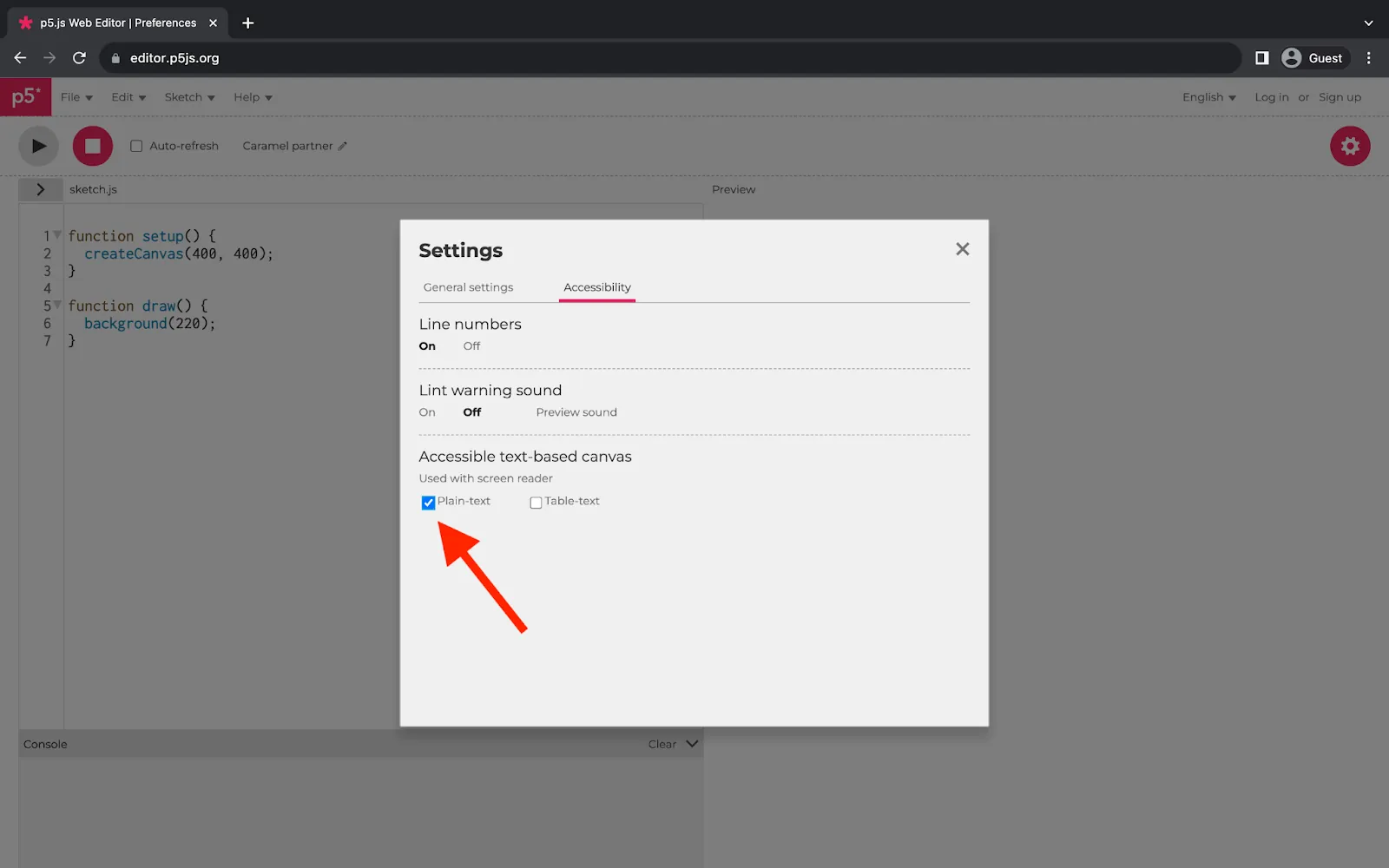 A web browser displaying the p5.js Web Editor. A square menu in the middle of the page displays accessibility settings. A red arrow points to the ‘Accessible text-based canvas’ section of the menu. The ‘Plain-text’ option is checked.